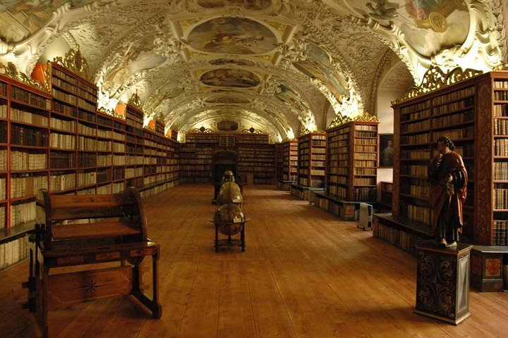 Discover the elegance of Strahov Library where ancient tomes and stunning frescoes create a unique journey through history offering an unparalleled glimpse into Prague's literary treasures.
